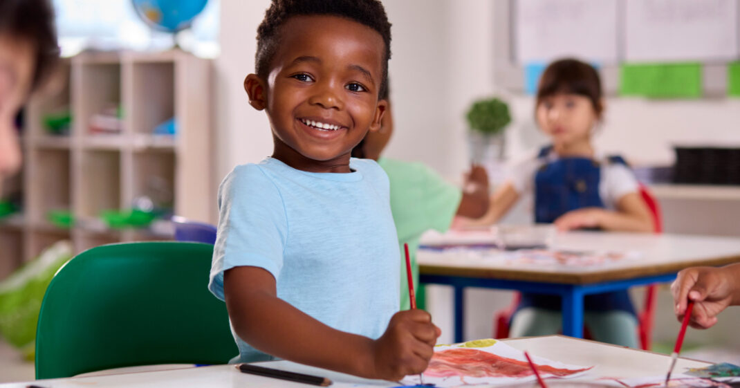 child painting a picture
